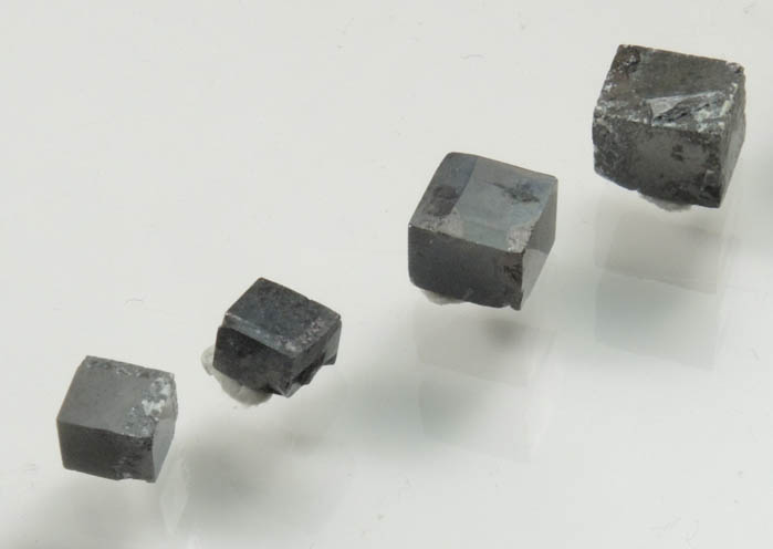 Magnetite exhibiting rare cubic habit (set of 8 crystals) from ZCA Mine No. 4, Fowler Ore Body, 2500' Level, Balmat, St. Lawrence County, New York