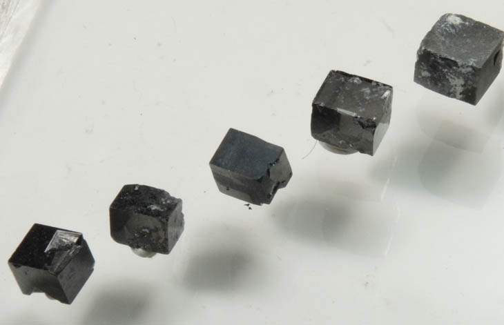 Magnetite exhibiting rare cubic habit (set of 8 crystals) from ZCA Mine No. 4, Fowler Ore Body, 2500' Level, Balmat, St. Lawrence County, New York