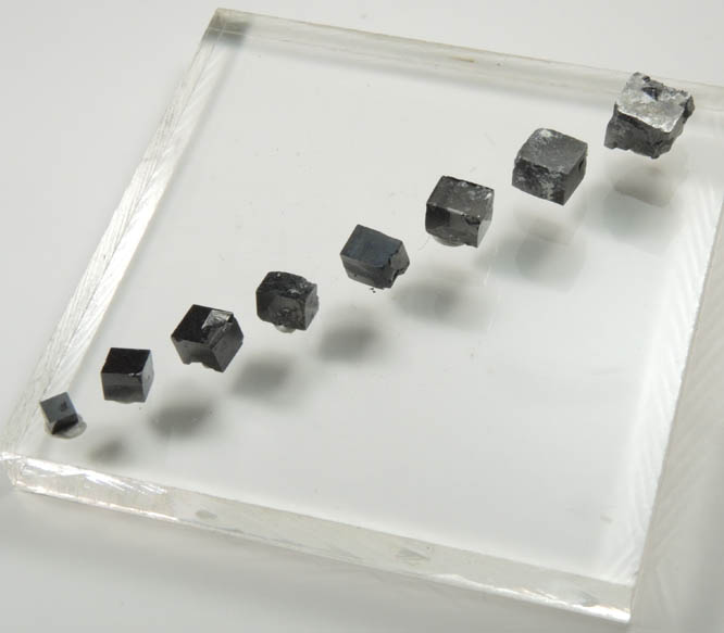 Magnetite exhibiting rare cubic habit (set of 8 crystals) from ZCA Mine No. 4, Fowler Ore Body, 2500' Level, Balmat, St. Lawrence County, New York