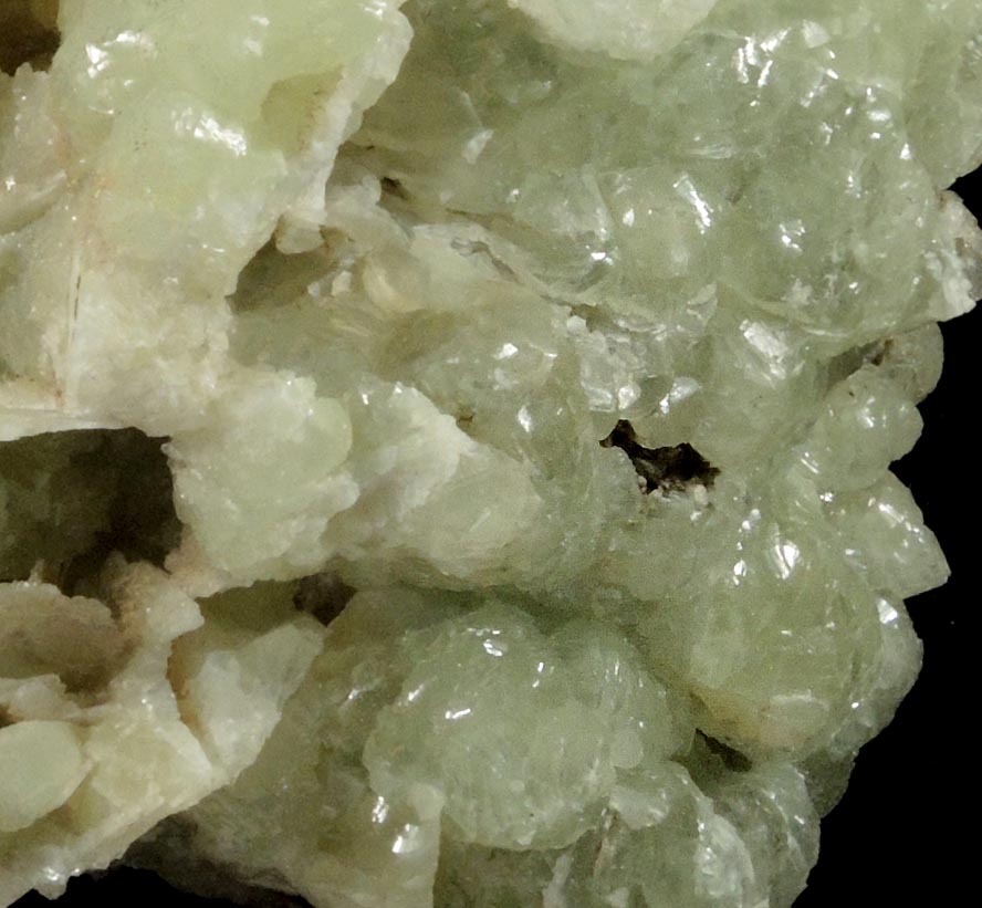 Prehnite with pseudomorphic cavities after bladed Anhydrite crystals from Prospect Park Quarry, Prospect Park, Passaic County, New Jersey