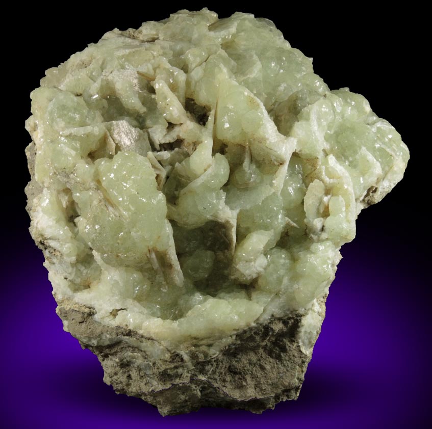 Prehnite with pseudomorphic cavities after bladed Anhydrite crystals from Prospect Park Quarry, Prospect Park, Passaic County, New Jersey