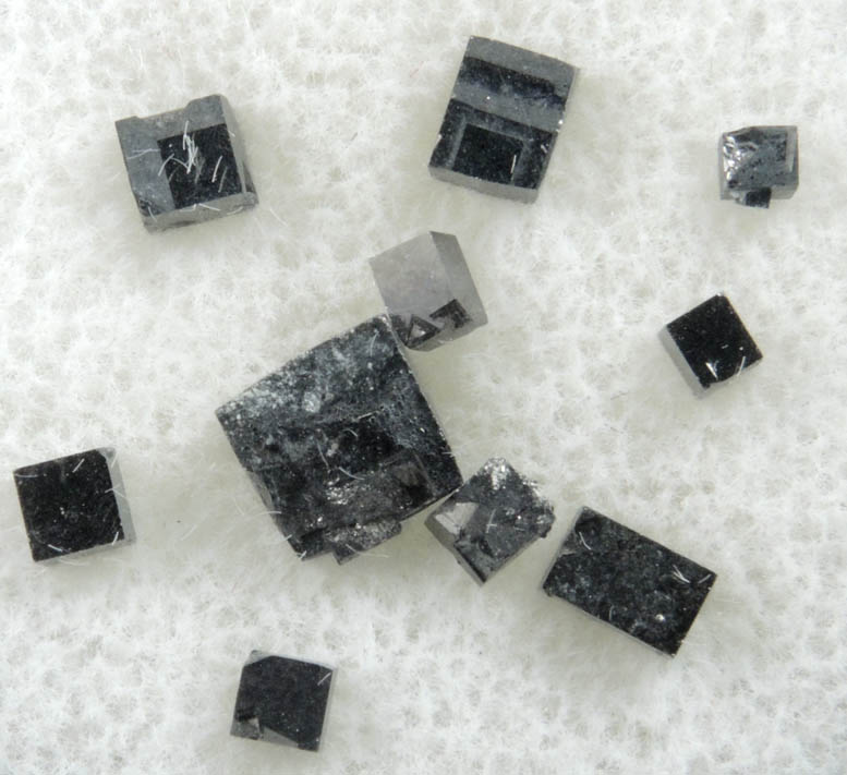 Magnetite exhibiting rare cubic habit (set of 8 crystals) from ZCA Mine No. 4, Fowler Ore Body, 2500' Level, Balmat, St. Lawrence County, New York