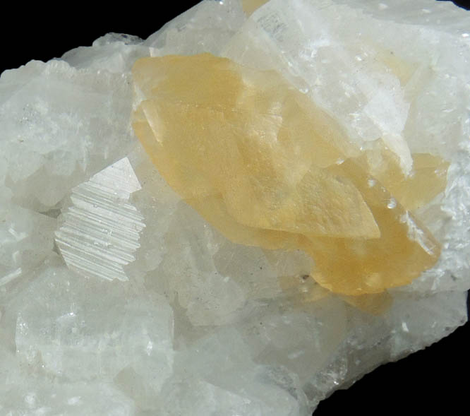 Hydroxyapophyllite-(K) (formerly apophyllite-(KOH)) with twinned Calcite from Goose Creek Quarry, near Leesburg, Loudon County, Virginia