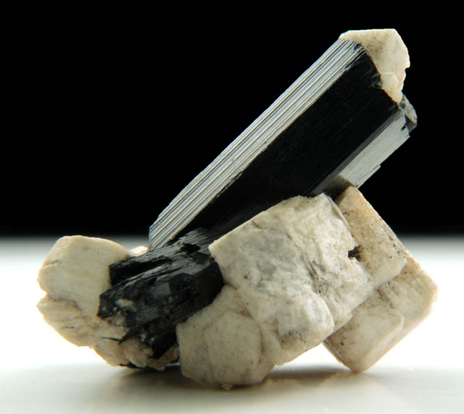 Arfvedsonite (rare twinned terminated Arfvedsonite crystal) on Microcline from Hurricane Mountain, east of Intervale, Carroll County, New Hampshire