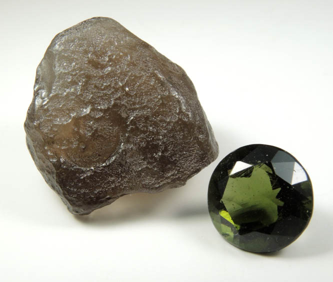 Moldavite (Tektite  natural glass caused by meteorite impact) with 3.95 carat faceted gemstone from Vltava (Moldau) River, southern Bohemia, Czech Republic (Type Locality for Moldavite)