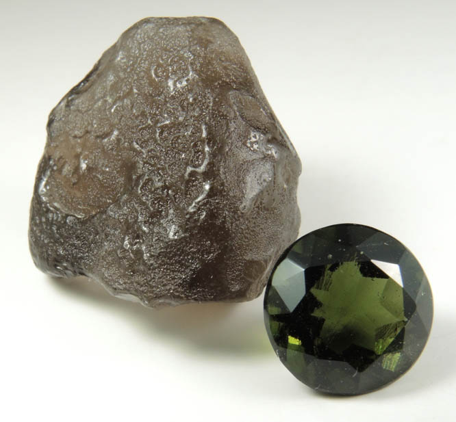 Moldavite (Tektite  natural glass caused by meteorite impact) with 3.95 carat faceted gemstone from Vltava (Moldau) River, southern Bohemia, Czech Republic (Type Locality for Moldavite)