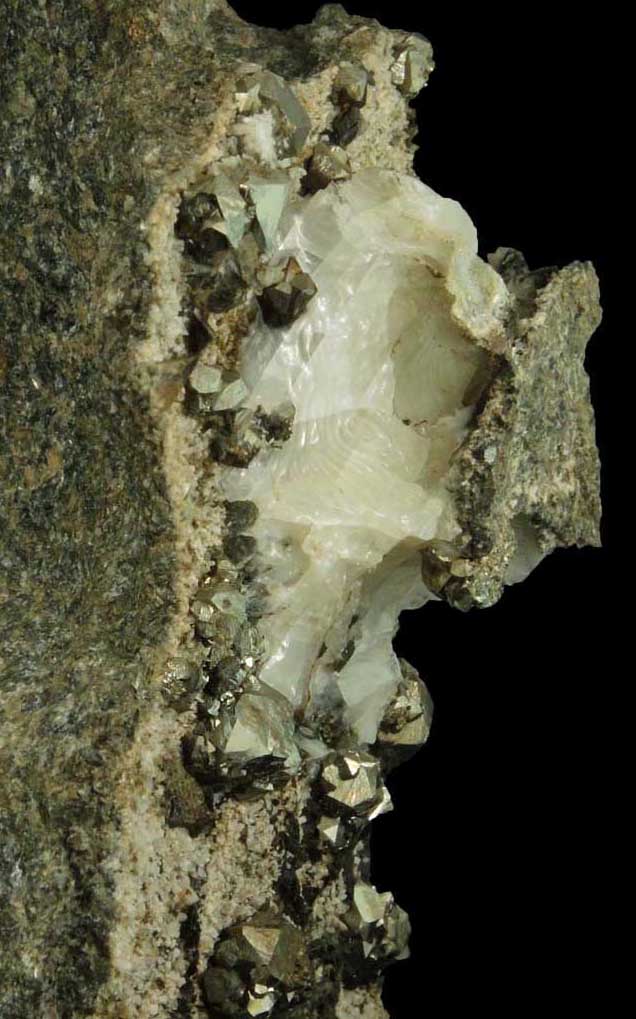 Pyrite and Calcite from Bull's Ferry Road condominium construction site, North Bergen, Hudson County, New Jersey