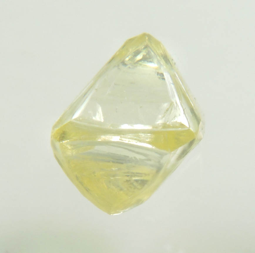 Diamond (0.87 carat fancy light-yellow gem-grade cuttable octahedral uncut diamond) from Jwaneng Mine, Naledi River Valley, Botswana