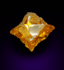Diamond (0.27 carat fancy intense-yellow cavernous cubic crystal) from Mbuji-Mayi, 300 km east of Tshikapa, Democratic Republic of the Congo