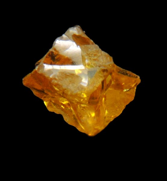 Diamond (0.27 carat fancy intense-yellow cavernous cubic crystal) from Mbuji-Mayi, 300 km east of Tshikapa, Democratic Republic of the Congo