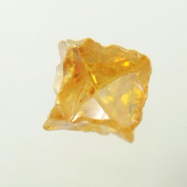 Diamond (0.27 carat fancy intense-yellow cavernous cubic crystal) from Mbuji-Mayi, 300 km east of Tshikapa, Democratic Republic of the Congo