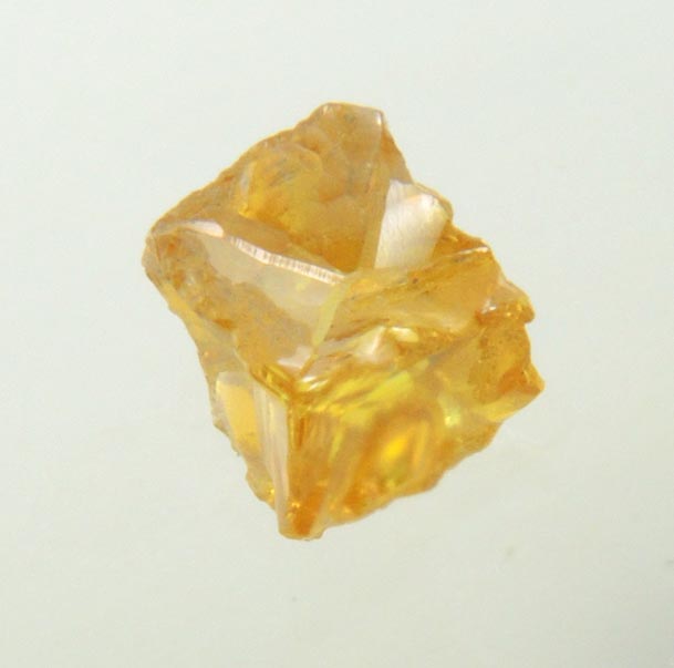 Diamond (0.27 carat fancy intense-yellow cavernous cubic crystal) from Mbuji-Mayi, 300 km east of Tshikapa, Democratic Republic of the Congo