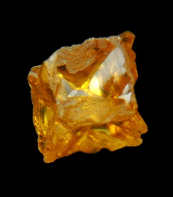 Diamond (0.27 carat fancy intense-yellow cavernous cubic crystal) from Mbuji-Mayi, 300 km east of Tshikapa, Democratic Republic of the Congo