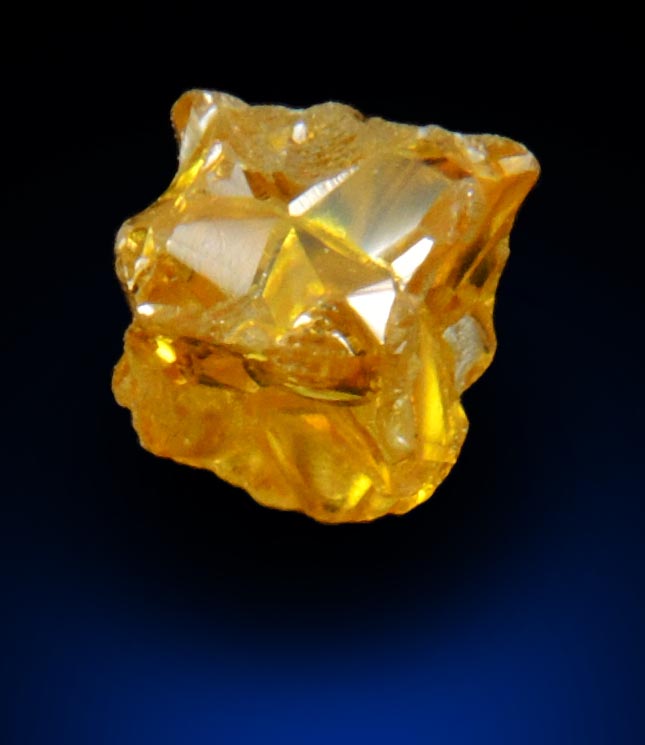 Diamond (0.60 carat fancy intense-yellow cavernous cubic crystal) from Mbuji-Mayi, 300 km east of Tshikapa, Democratic Republic of the Congo