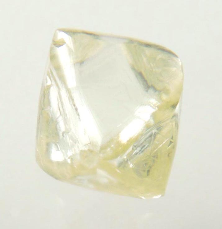 Diamond (0.86 carat yellow gem-quality cuttable octahedral uncut diamond) from Jwaneng Mine, Naledi River Valley, Botswana