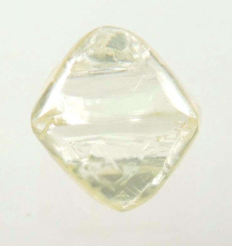 Diamond (0.86 carat yellow gem-quality cuttable octahedral uncut diamond) from Jwaneng Mine, Naledi River Valley, Botswana