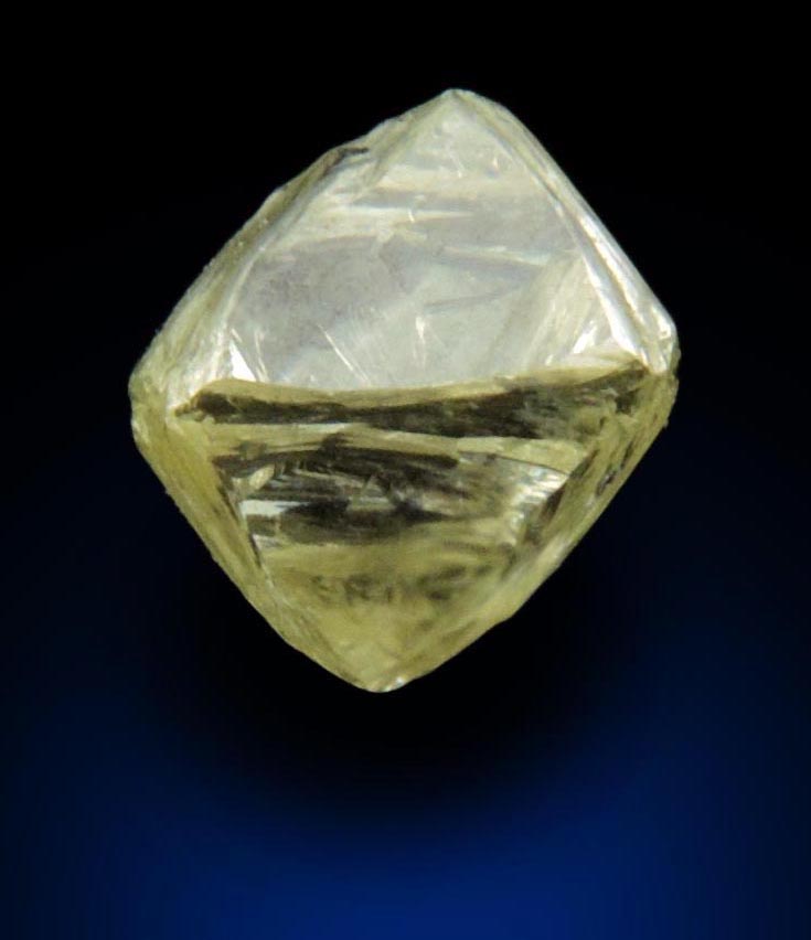 Diamond (0.76 carat yellow gem-quality cuttable octahedral rough diamond) from Jwaneng Mine, Naledi River Valley, Botswana