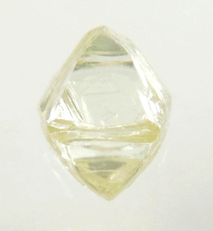 Diamond (0.76 carat yellow gem-quality cuttable octahedral rough diamond) from Jwaneng Mine, Naledi River Valley, Botswana