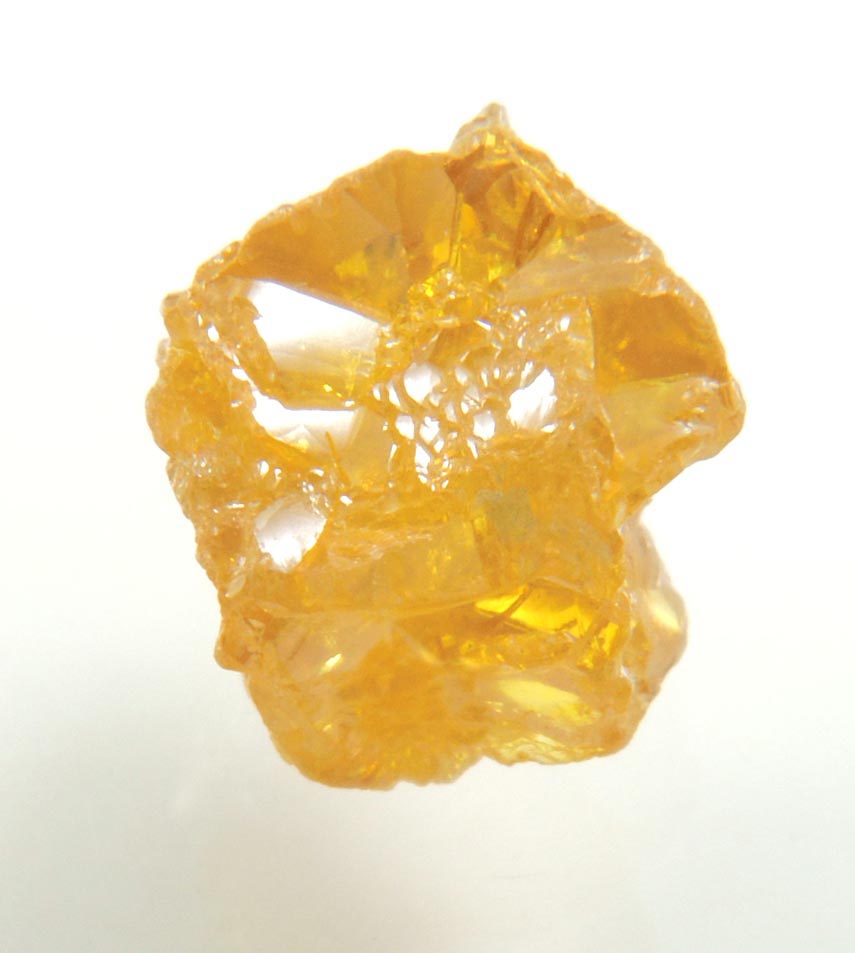 Diamond (2.64 carat fancy intense yellow-brown interconnected cavernous cubic uncut diamond) from Mbuji-Mayi, 300 km east of Tshikapa, Democratic Republic of the Congo