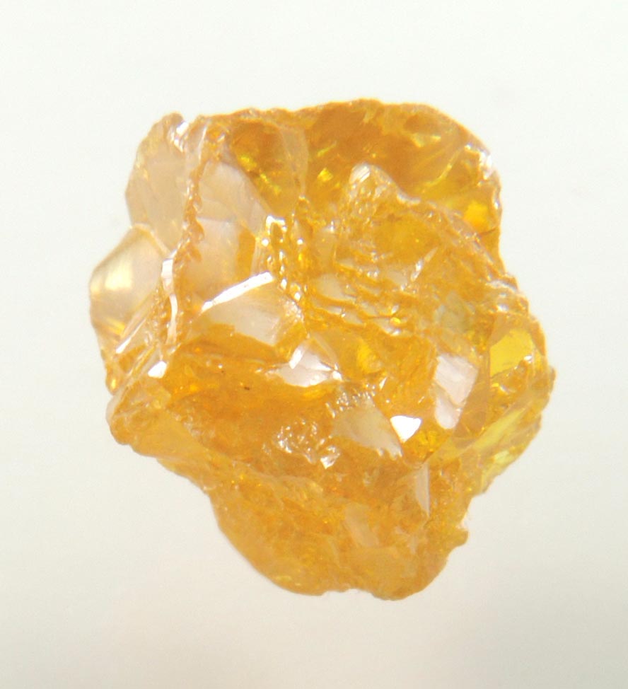 Diamond (2.64 carat fancy intense yellow-brown interconnected cavernous cubic uncut diamond) from Mbuji-Mayi, 300 km east of Tshikapa, Democratic Republic of the Congo