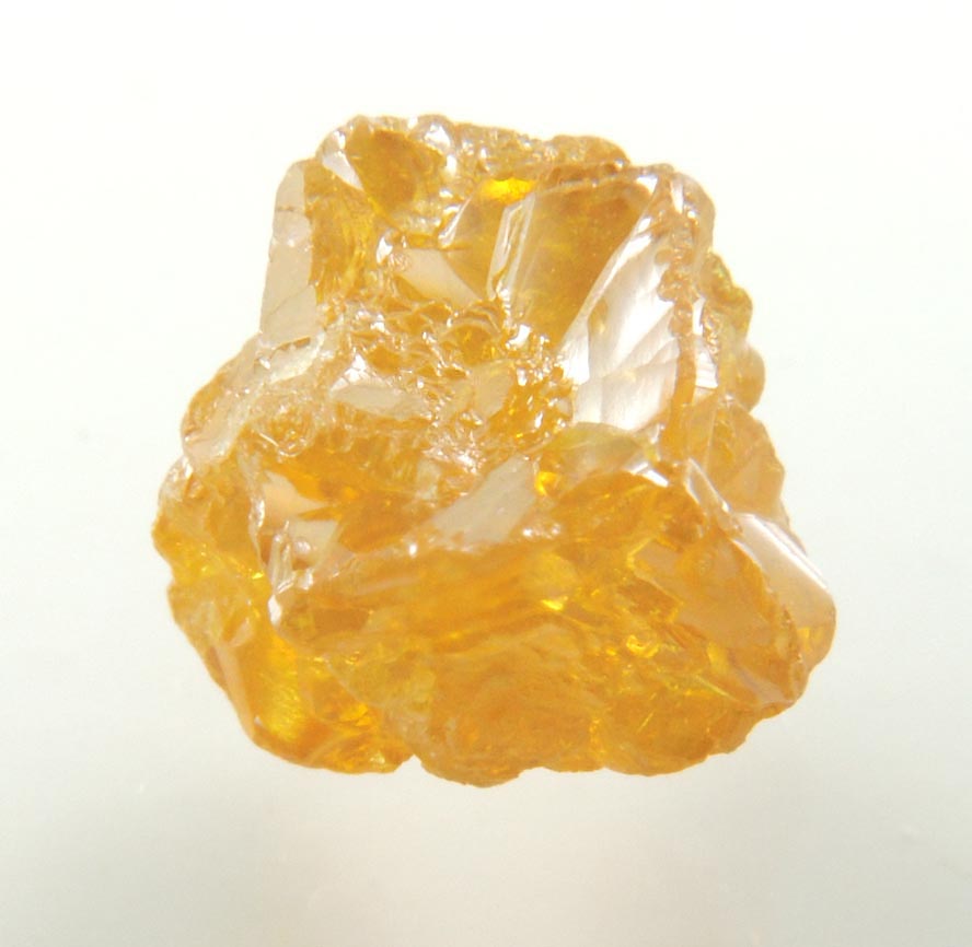 Diamond (2.64 carat fancy intense yellow-brown interconnected cavernous cubic uncut diamond) from Mbuji-Mayi, 300 km east of Tshikapa, Democratic Republic of the Congo