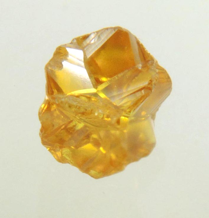 Diamond (0.33 carat fancy intense-yellow cavernous cubic uncut rough diamond) from Mbuji-Mayi, 300 km east of Tshikapa, Democratic Republic of the Congo