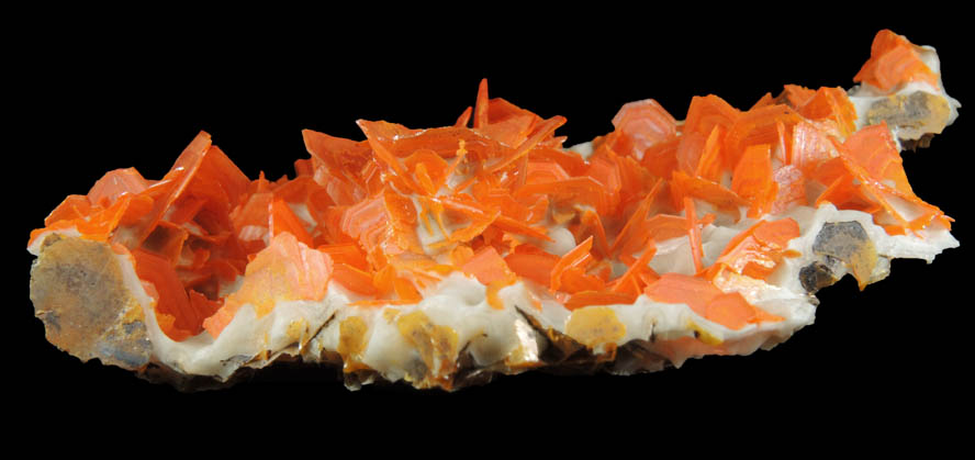 Wulfenite on Calcite from Jianshan Mine, Kuruktag Mountains, 300 km southeast of rmqi, Shanshan County, Xinjiang Uygur Region, China