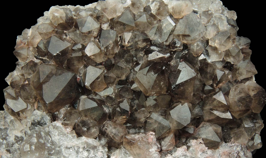 Quartz var. Smoky Quartz with Hematite inclusions from Auchenlosh Quarry, Dalbeattie, Dumfries & Galloway, Scotland