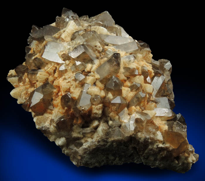 Quartz var. Smoky Quartz (Dauphiné-law twins) on Microcline from Moat Mountain, west of North Conway, Carroll County, New Hampshire