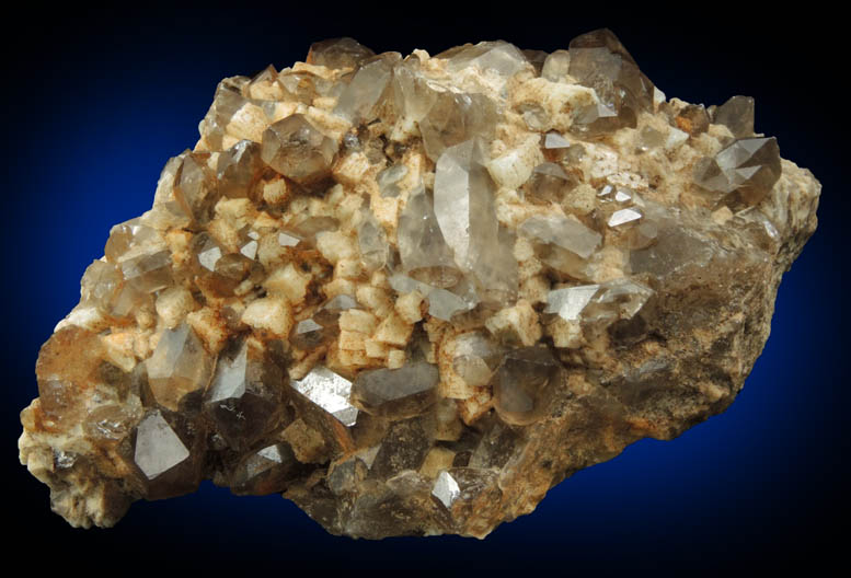 Quartz var. Smoky Quartz (Dauphin-law twins) on Microcline from Moat Mountain, west of North Conway, Carroll County, New Hampshire