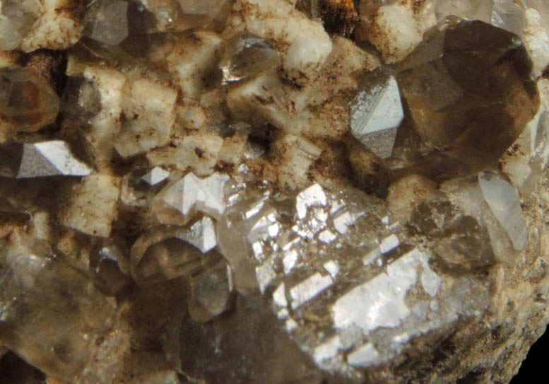 Quartz var. Smoky Quartz (Dauphin-law twins) on Microcline from Moat Mountain, west of North Conway, Carroll County, New Hampshire