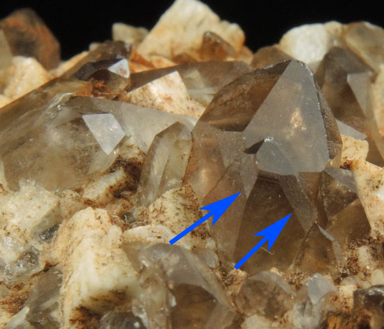 Quartz var. Smoky Quartz (Dauphin-law twins) on Microcline from Moat Mountain, west of North Conway, Carroll County, New Hampshire