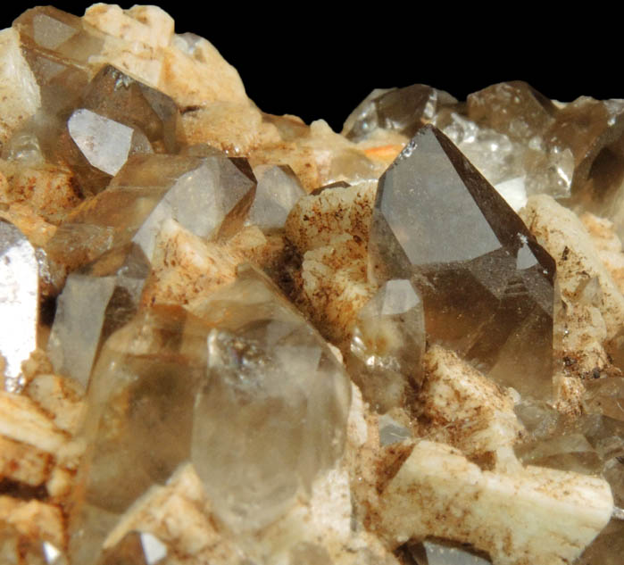 Quartz var. Smoky Quartz (Dauphin-law twins) on Microcline from Moat Mountain, west of North Conway, Carroll County, New Hampshire