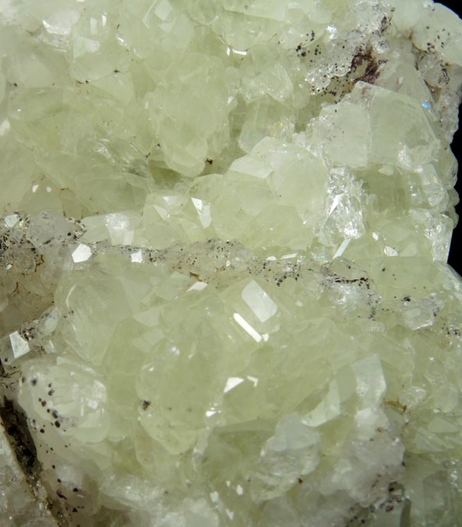 Datolite with pseudomorphic molds after Calcite plus minor Hematite from Braen's Quarry, Haledon, Passaic County, New Jersey