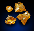 Diamond (set of four fancy-intense yellow cavernous crystals totaling 1.25 carats) from Mbuji-Mayi, 300 km east of Tshikapa, Democratic Republic of the Congo