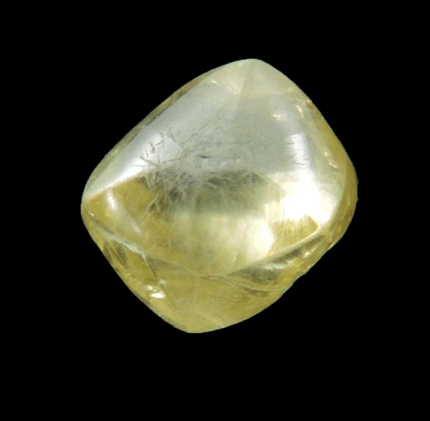 Diamond (1.04 carat gem-grade yellow flattened complex uncut diamond) from Oranjemund District, southern coastal Namib Desert, Namibia