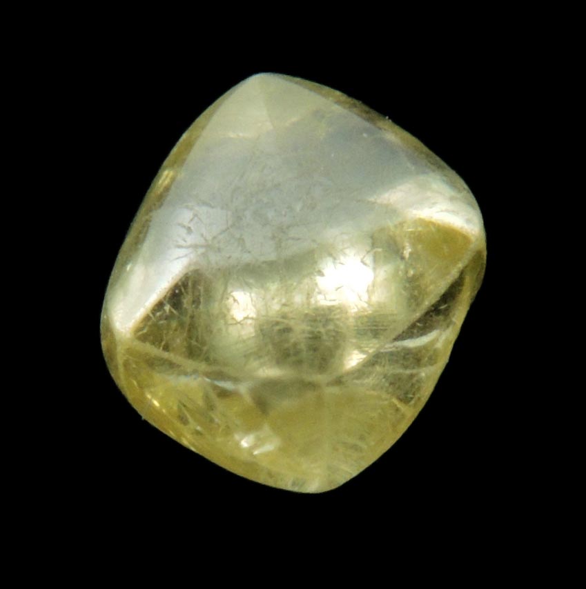 Diamond (1.04 carat gem-grade yellow flattened complex uncut diamond) from Oranjemund District, southern coastal Namib Desert, Namibia