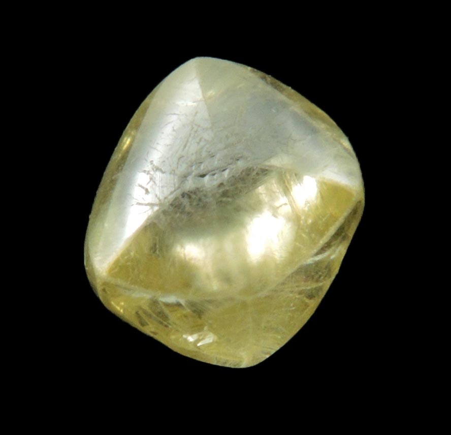 Diamond (1.04 carat gem-grade yellow flattened complex uncut diamond) from Oranjemund District, southern coastal Namib Desert, Namibia