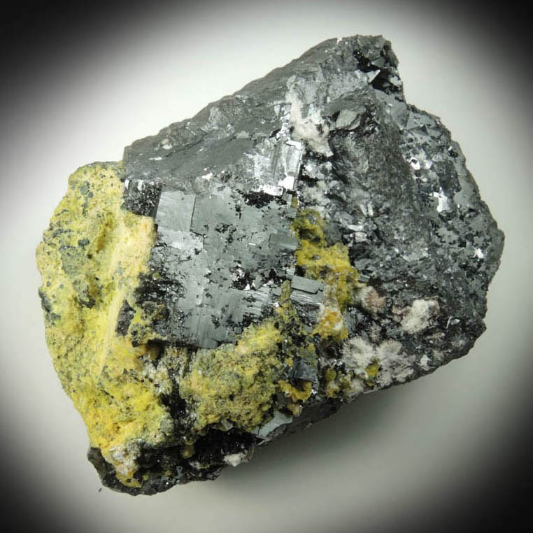 Bixbyite with Ettringite and Brucite from N'Chwaning II Mine, Kalahari Manganese Field, Northern Cape Province, South Africa