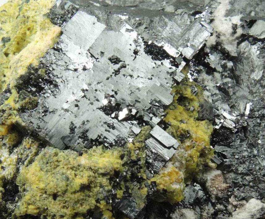 Bixbyite with Ettringite and Brucite from N'Chwaning II Mine, Kalahari Manganese Field, Northern Cape Province, South Africa
