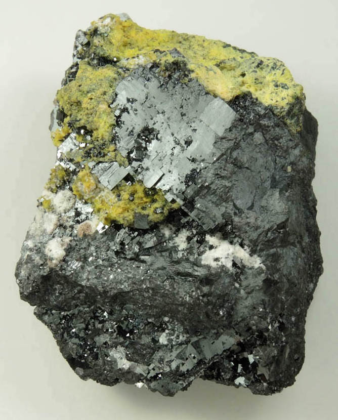 Bixbyite with Ettringite and Brucite from N'Chwaning II Mine, Kalahari Manganese Field, Northern Cape Province, South Africa