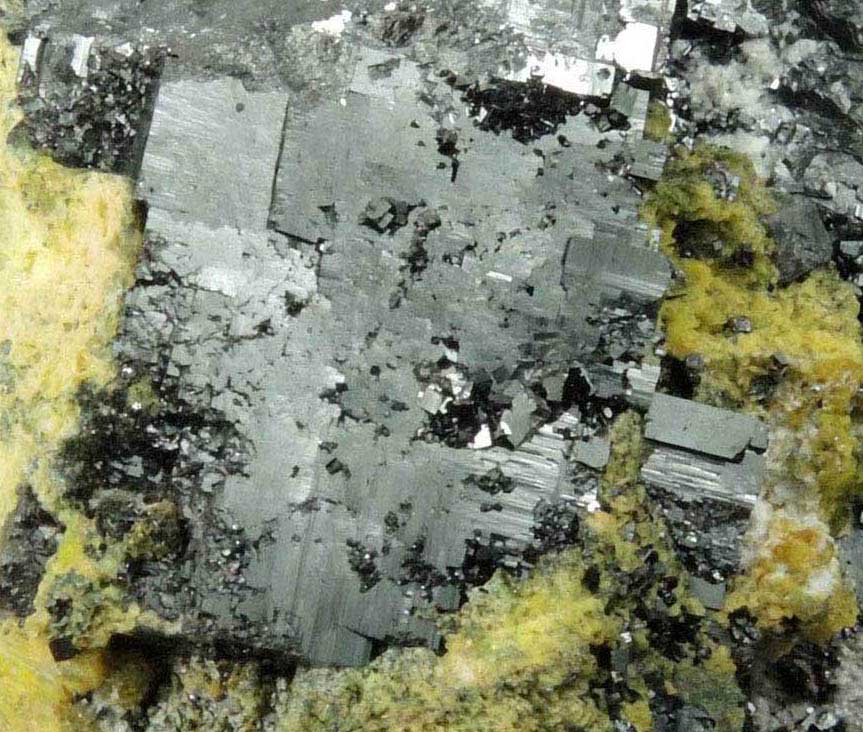 Bixbyite with Ettringite and Brucite from N'Chwaning II Mine, Kalahari Manganese Field, Northern Cape Province, South Africa