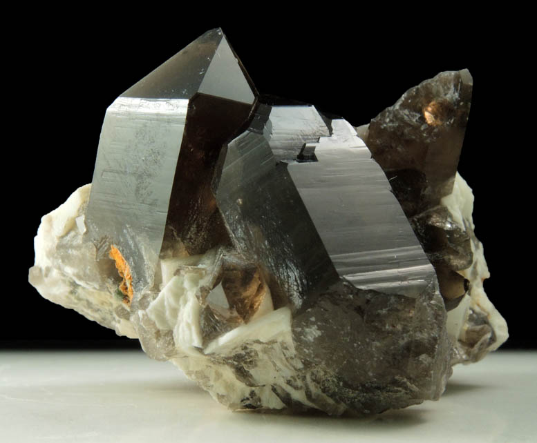 Quartz var. Smoky Quartz (Dauphin Law Twins) on Microcline from Moat Mountain, Oliver Diggings, Hale's Location, west of North Conway, New Hampshire