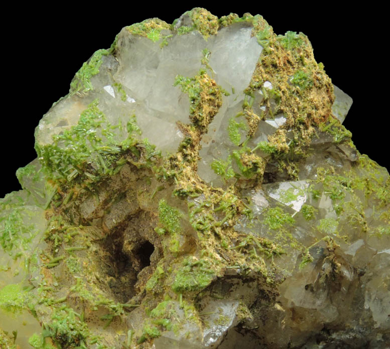 Pyromorphite on Quartz with pseudomorphic molds after hoppered Galena from Sarrowcole Vein, Laverock Hall, Leadhills, South Lanarkshire, Strathclyde, Scotland