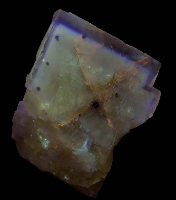 Photo below under shortwave ultraviolet illumination of Fluorite with Chalcopyrite inclusions from Minerva No. 1 Mine, Cave-in-Rock District, Hardin County, Illinois Fluorite with Chalcopyrite inclusions from Minerva No. 1 Mine, Cave-in-Rock District, Hardin County, Illinois