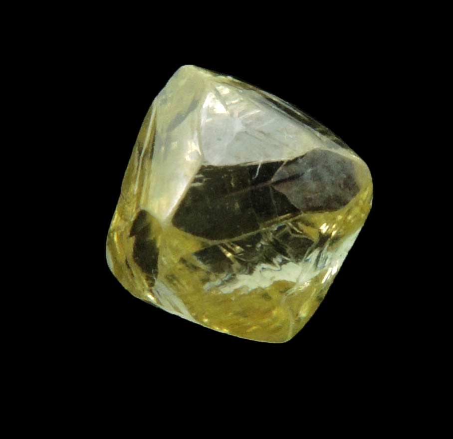 Diamond (1.36 carat gem-grade yellow octahedral uncut diamond) from Oranjemund District, southern coastal Namib Desert, Namibia
