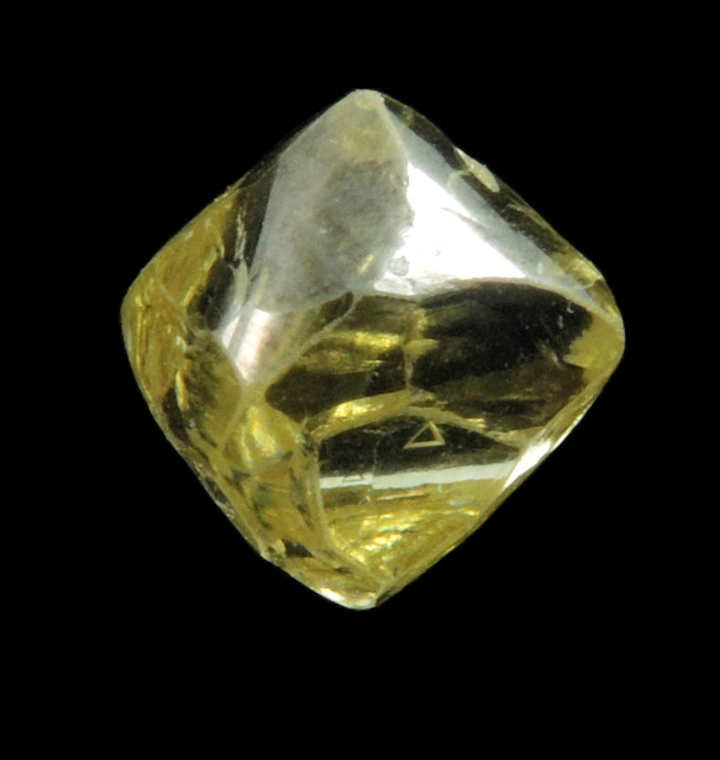 Diamond (1.36 carat gem-grade yellow octahedral uncut diamond) from Oranjemund District, southern coastal Namib Desert, Namibia