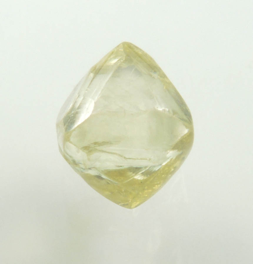 Diamond (1.36 carat gem-grade yellow octahedral uncut diamond) from Oranjemund District, southern coastal Namib Desert, Namibia