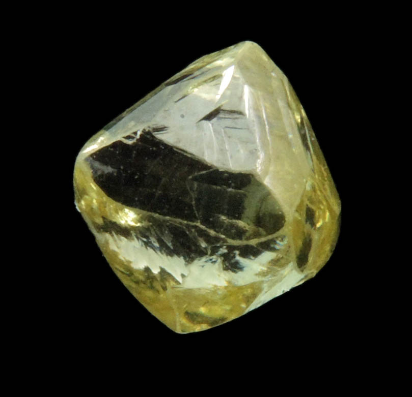 Diamond (1.36 carat gem-grade yellow octahedral uncut diamond) from Oranjemund District, southern coastal Namib Desert, Namibia