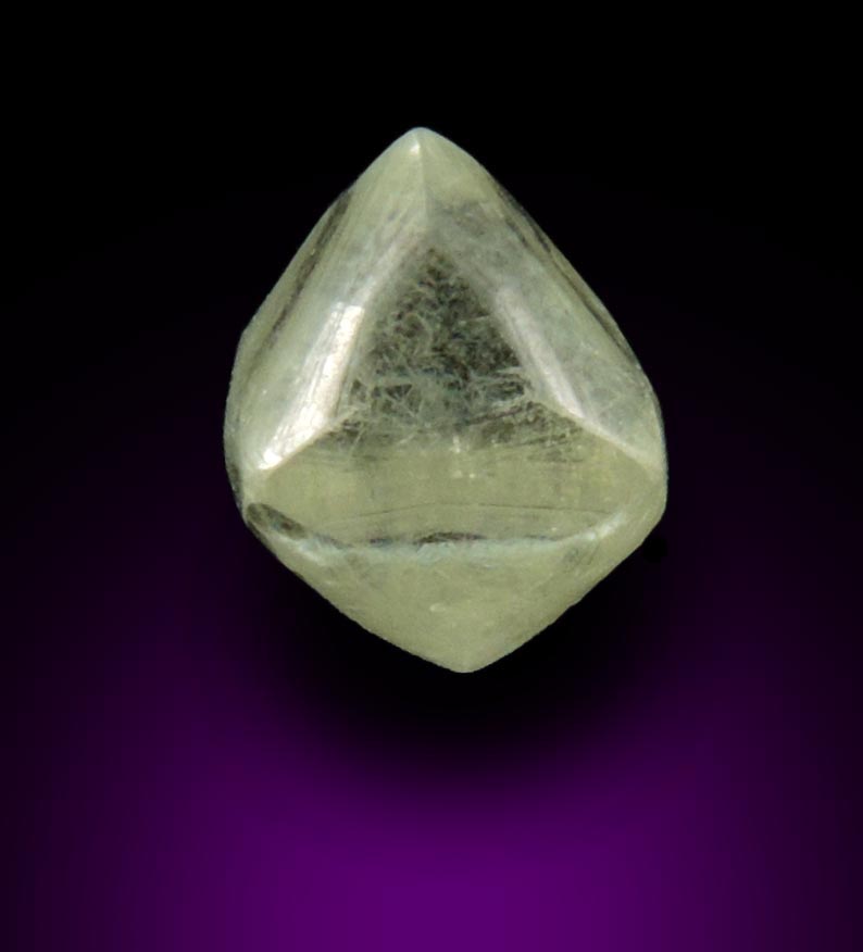 Diamond (1.23 carat gem-grade pale-yellow octahedral uncut diamond) from Oranjemund District, southern coastal Namib Desert, Namibia